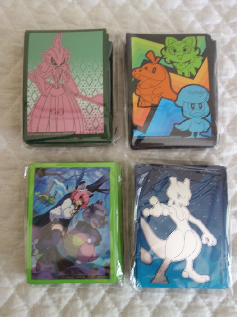 (i)	Lot of 4 NIP 65 count ea POKEMAN Trading Card Sleeves